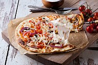 De ce pizza este un preparat atât de popular?