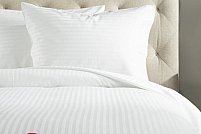 Lenjerii de pat: adaugă eleganță și confort în dormitorul tău